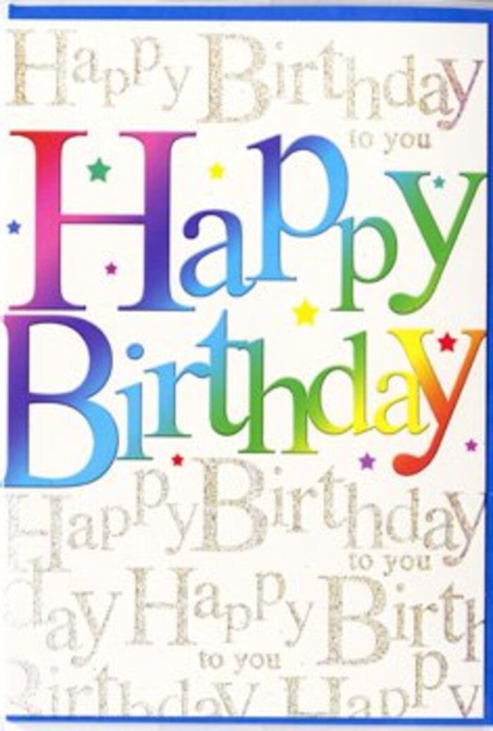 This birthday card appears as a vibrant, joyful keepsake, as if it has captured the excitement of blowing out candles in one vivid snapshot. Across the centre, the words Happy Birthday are printed in large, confident letters that sweep from one side of the card to the other, each character richly filled with a gradient of colour that melts smoothly into the next. Deep berry reds give way to glowing oranges and warm pinks, before shifting into jewel-toned blues, verdant greens, and bright, sunny yellows, much like the shifting tones in a hand-tied bouquet from a Berkhamsted florist, carefully blended to look both playful and polished. The font is bold and friendly, with rounded edges that make the message feel open and inviting. Behind this central greeting, a soft veil of scripted text repeats Happy Birthday to you in a delicate, gold-toned cursive that glints when it catches the light, reminiscent of the faint shimmer on ribbon curling around a gift. The script is small but flowing, like a quiet chorus echoing the main message, layering warmth and sincerity into the design. Here and there, tiny multicoloured specks and subtle star-like accents are scattered across the background, evoking the impression of confetti or flickers from sparklers in the evening outside a home near Berkhamsted Castle. The surface looks smooth and slightly glossy, suggesting a quality card you would be proud to send for a milestone celebration or a simple, heartfelt birthday. The overall feel is one of easy happiness and genuine care, the kind of card that pairs perfectly with a fresh arrangement delivered locally, turning a birthday greeting into a complete moment of colour and joy.